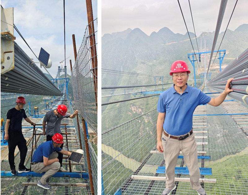 马宗源与其他博士在花江峡谷大桥施工现场开展主缆架设北斗卫星定位科研工作。